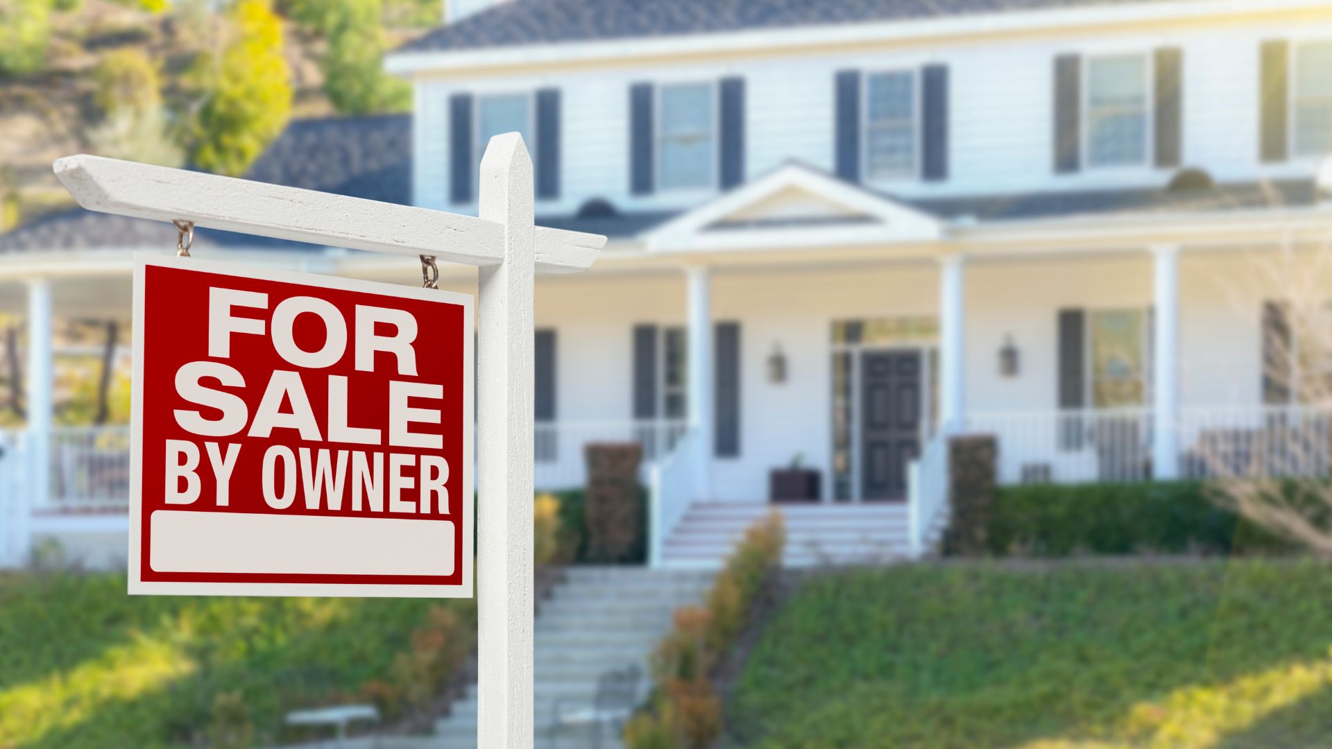 For sale sign in front of a Southern California home