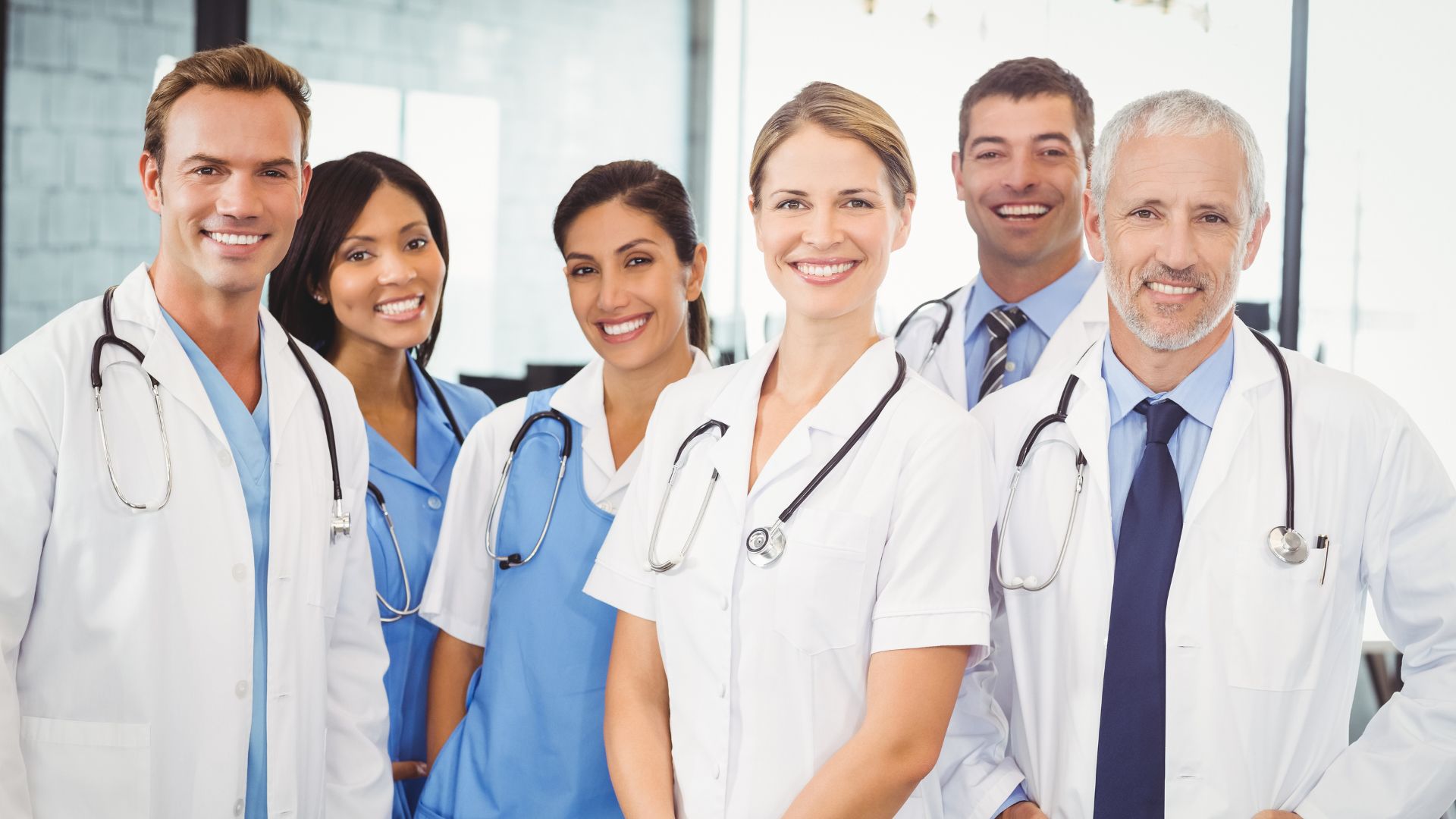 Group of medical professionals in clinical attire